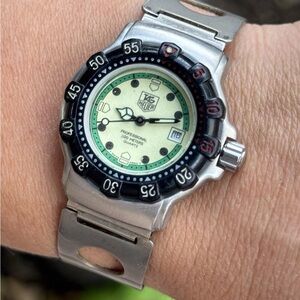 Tag Heuer Professional Quartz Watch with Silver and Black Accents